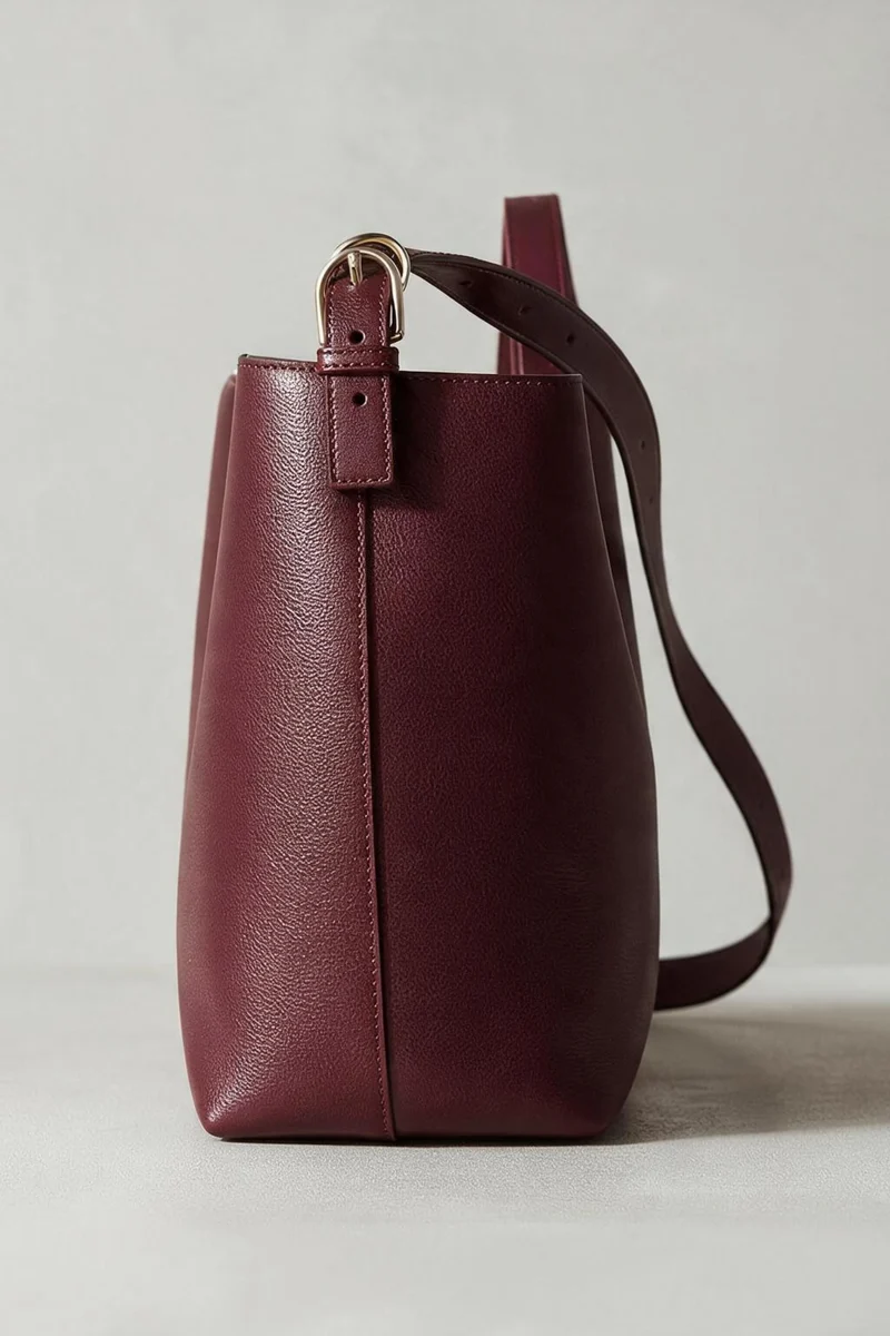 Bolso tachas granate