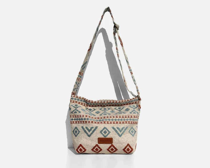 Bolsa bandolera mediana MINIOTS étnico caldera