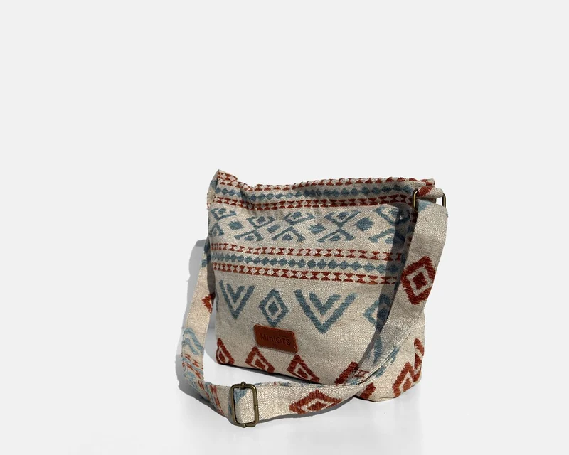 Bolsa bandolera mediana MINIOTS étnico caldera