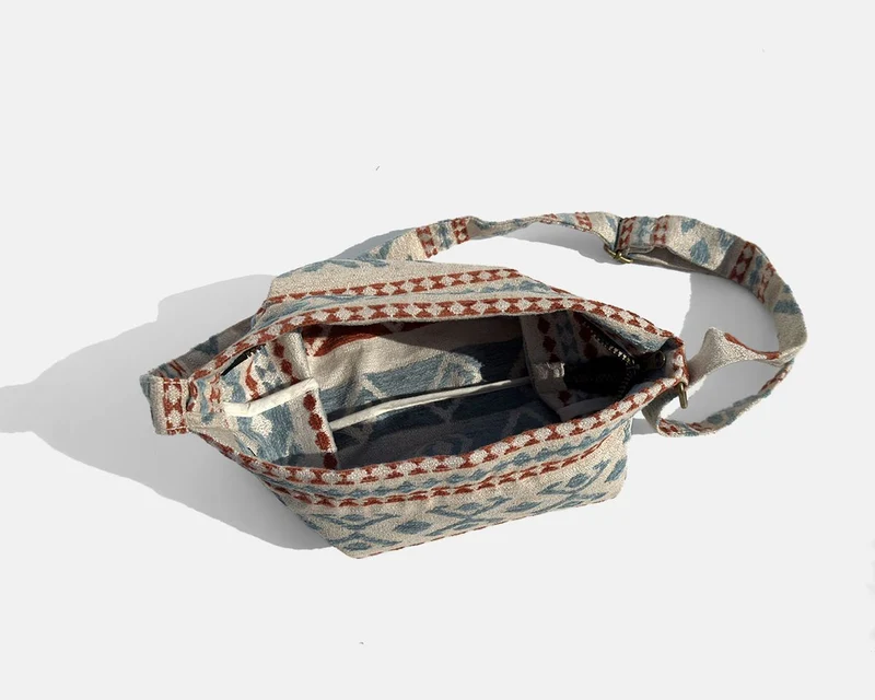 Bolsa bandolera mediana MINIOTS étnico caldera