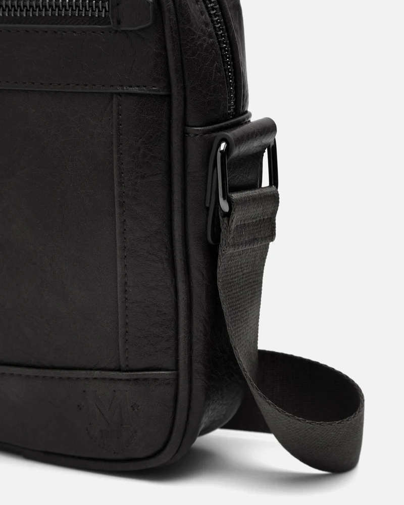 Tomy bolso bandolera pequeño