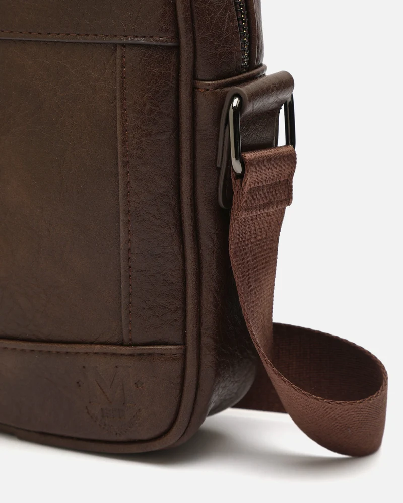 Tomy bolso bandolera pequeño