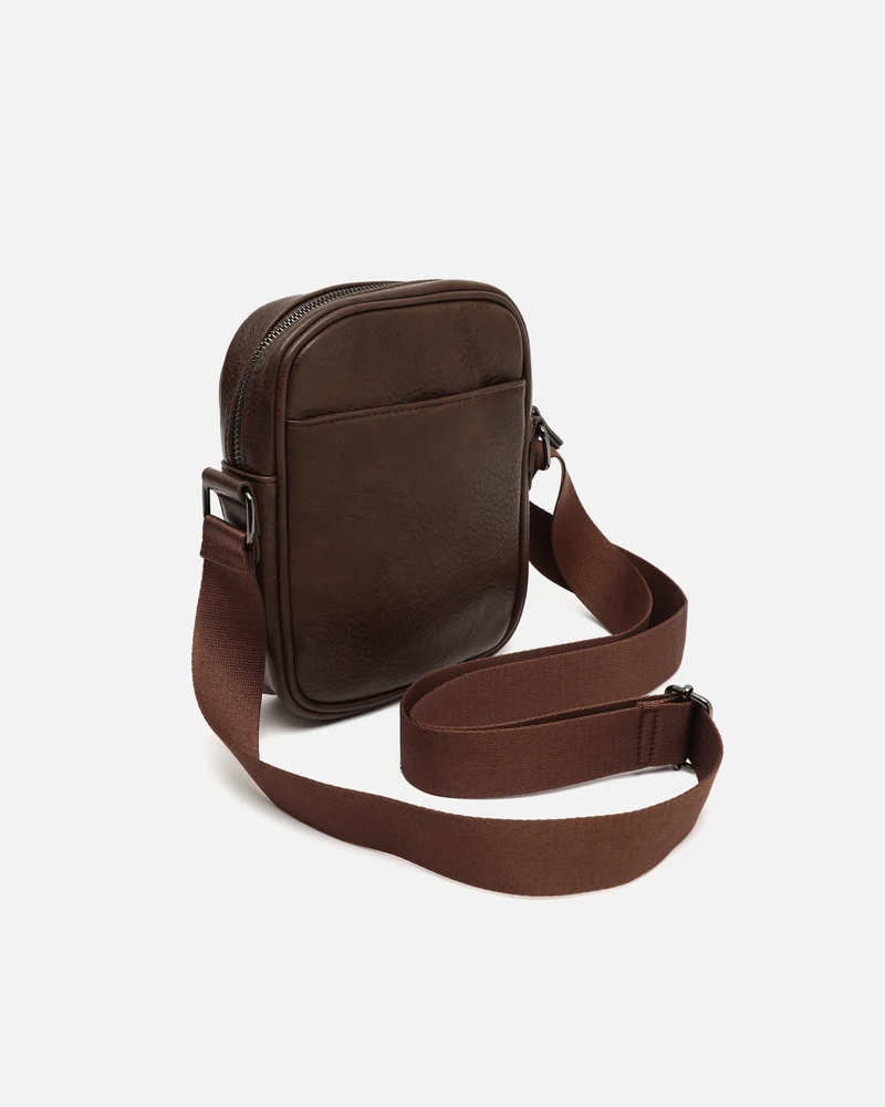 Tomy bolso bandolera pequeño