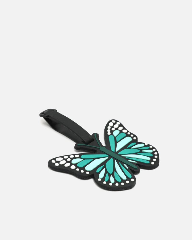 Mariposa identificador de equipaje en forma de mariposa