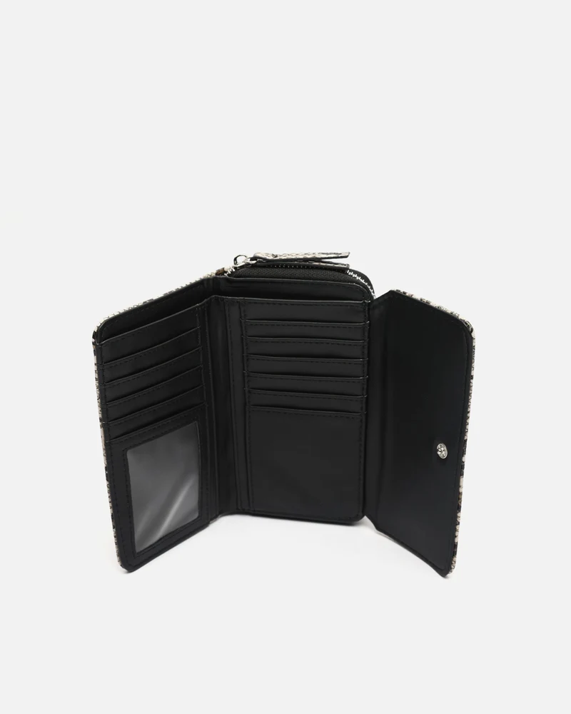 Serpis monedero grande animal print