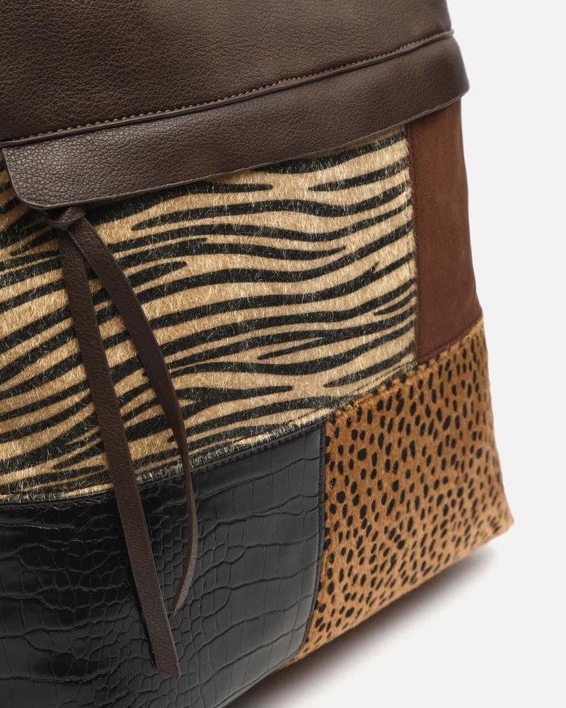 Zivera mochila antirrobo con estampado patchwork animal print