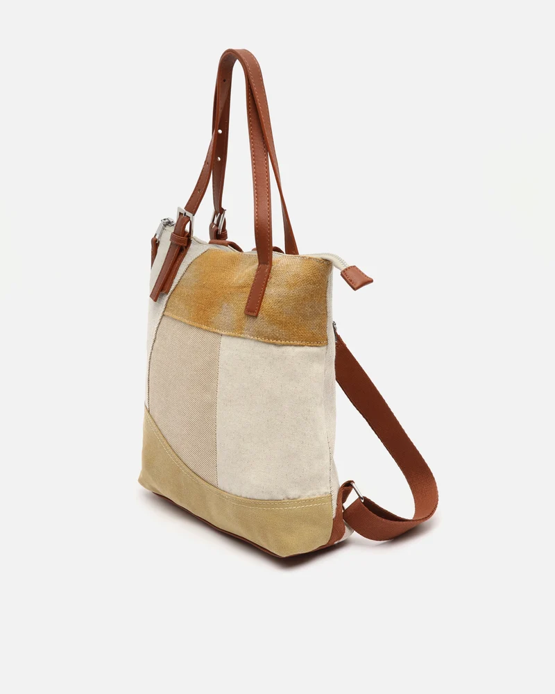 Narcisa mochila antirrobo con asas para el hombro y estampado patchwork efecto desgastado ED.