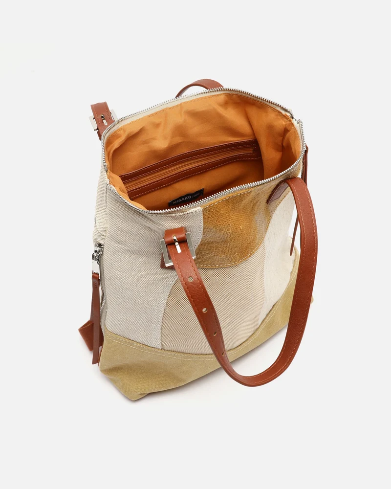 Narcisa mochila antirrobo con asas para el hombro y estampado patchwork efecto desgastado ED.