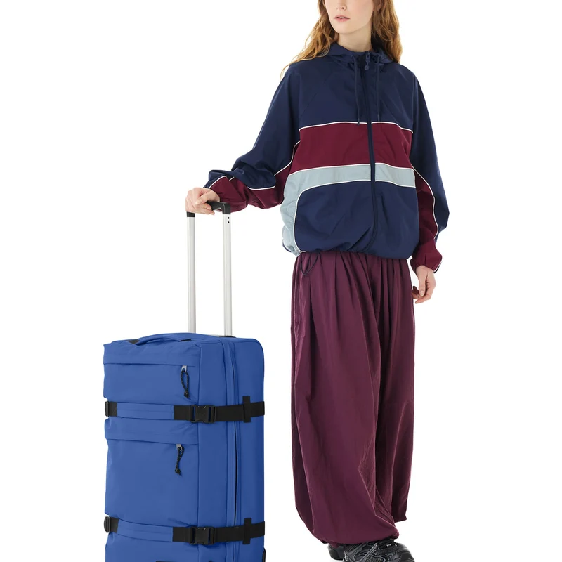 Eastpak Transit'r Plus - Bolsa de viaje con ruedas M 67 cm (indigo blue)