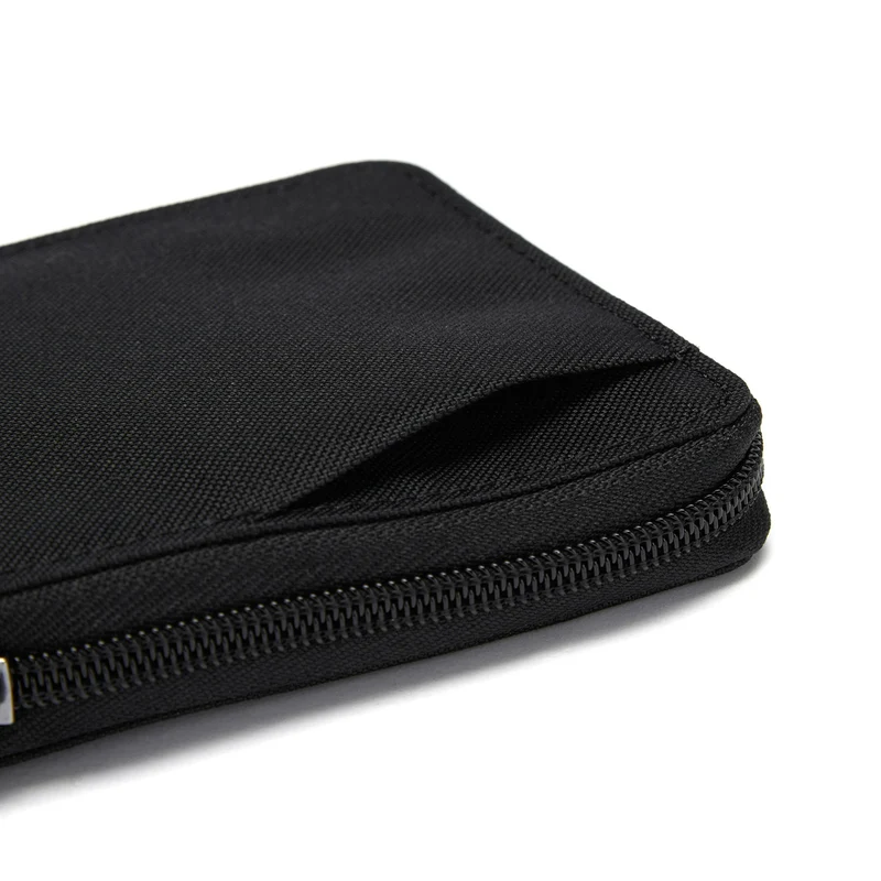 pacsafe RFIDsafe Zip Around Wallet - Cartera 6cc 11 cm (jet black)