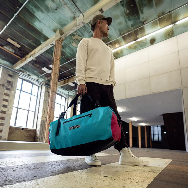 Ortlieb Duffle Lite 60 - Bolsa de viaje / Mochila 58 cm (blue cyber pink)