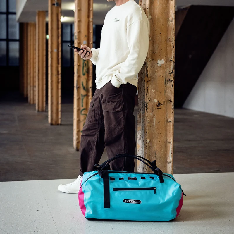 Ortlieb Duffle Lite 60 - Bolsa de viaje / Mochila 58 cm (blue cyber pink)
